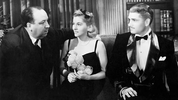 Alfred Hitchcock junto a Joan Fontaine y Laurence Oliver. 